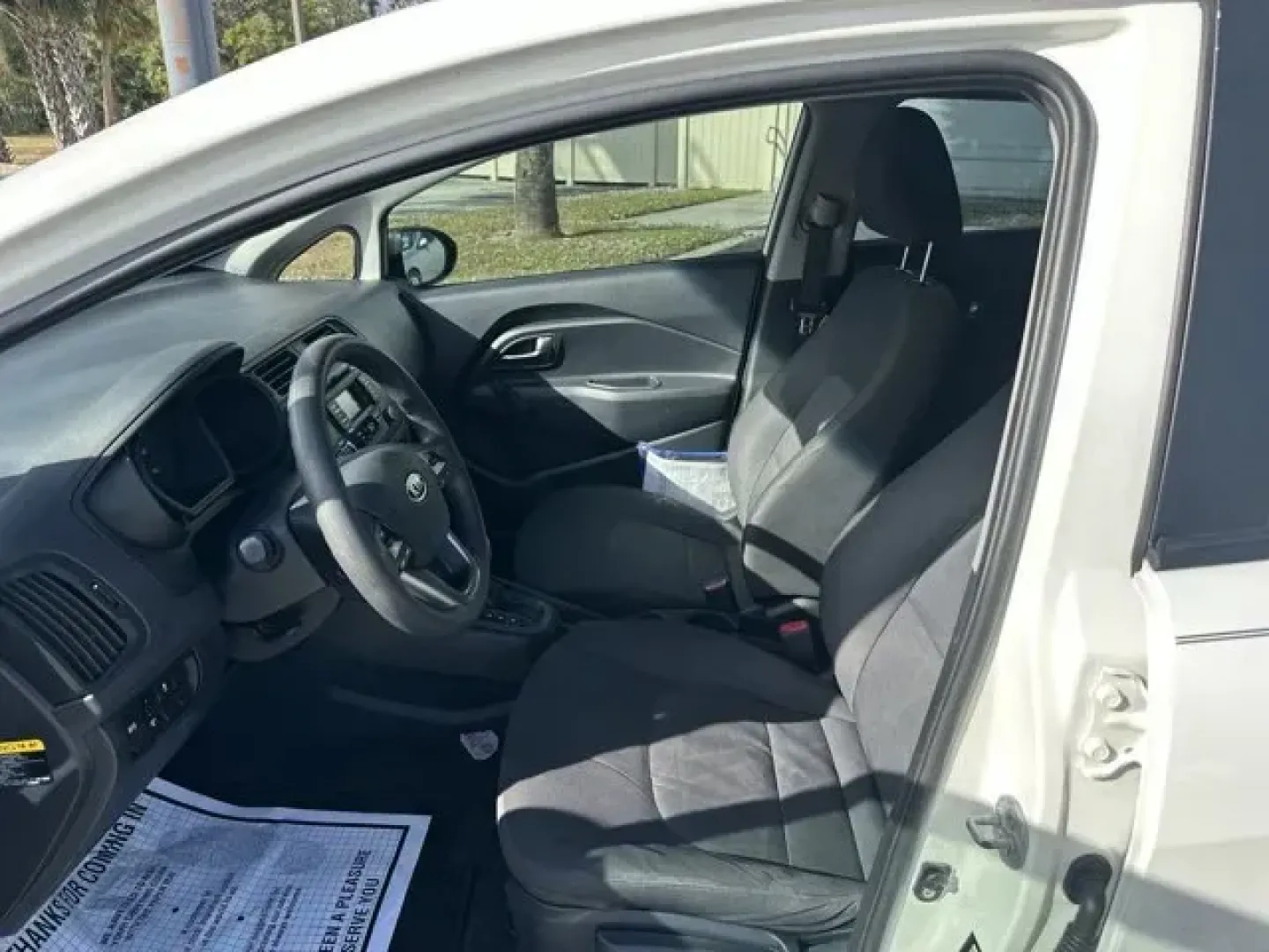 2013 Kia Rio (KNADM5A39D6) with an Other engine, AUTOMATIC transmission, located at 8829 US Hwy 19, Port Richey, FL, 34668, (727) 264-1107, 28.285917, -82.717346 - Only 124,430 Miles! Delivers 36 Highway MPG and 28 City MPG! This Kia Rio boasts a Gas I4 1.6L/97 engine powering this Automatic transmission. CLEAR WHITE, CARPETED FLOOR MATS, BLACK, SEAT TRIM.*This Kia Rio Comes Equipped with These Options *Woven Cloth Seat Trim, Vehicle stability management (VSM) - Photo#6