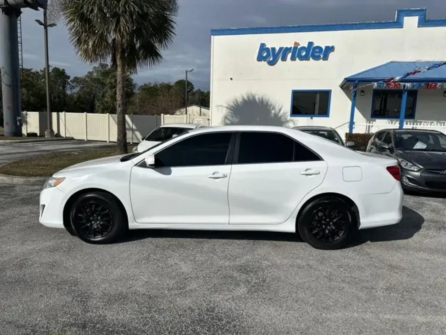 2014 Toyota Camry (4T1BF1FK5EU) with an Other engine, AUTOMATIC transmission, located at 8829 US Hwy 19, Port Richey, FL, 34668, (727) 264-1107, 28.285917, -82.717346 - KBB.com 10 Best Late-Model Used Cars Under $15,000. Only 118,636 Miles! Boasts 35 Highway MPG and 25 City MPG! This Toyota Camry delivers a Regular Unleaded I-4 2.5 L/152 engine powering this Automatic transmission. Window Grid Antenna, Valet Function, Trunk Rear Cargo Access.*This Toyota Camry Come - Photo#1