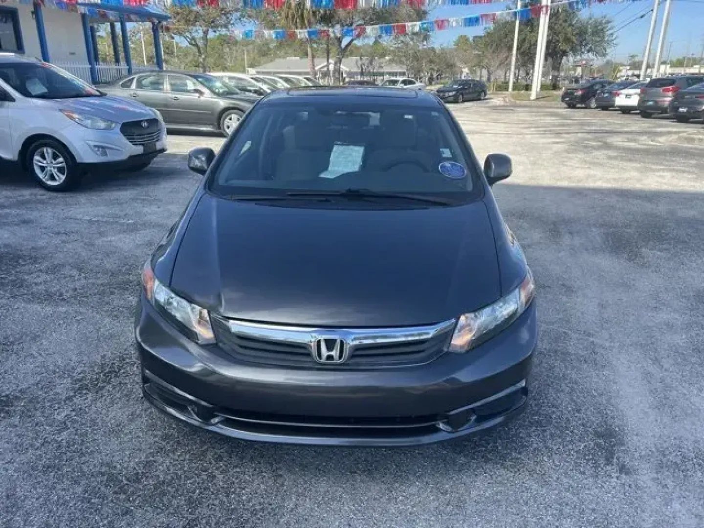 2012 Honda Civic (19XFB2F80CE) with an Other engine, AUTOMATIC transmission, located at 8829 US Hwy 19, Port Richey, FL, 34668, (727) 264-1107, 28.285917, -82.717346 - KBB.com Best Resale Value Awards. Only 142,636 Miles! Delivers 39 Highway MPG and 28 City MPG! This Honda Civic delivers a Gas I4 1.8L/110 engine powering this Automatic transmission. Vehicle Stability Assist (VSA) w/traction control, Variable intermittent windshield wipers, USB audio interface.* Th - Photo#1