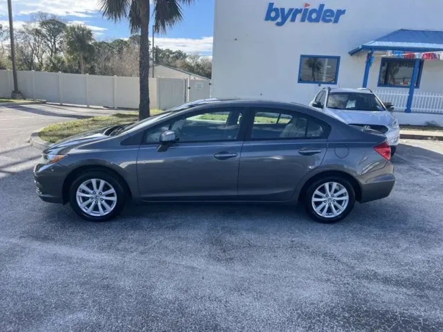 2012 Honda Civic (19XFB2F80CE) with an Other engine, AUTOMATIC transmission, located at 8829 US Hwy 19, Port Richey, FL, 34668, (727) 264-1107, 28.285917, -82.717346 - KBB.com Best Resale Value Awards. Only 142,636 Miles! Delivers 39 Highway MPG and 28 City MPG! This Honda Civic delivers a Gas I4 1.8L/110 engine powering this Automatic transmission. Vehicle Stability Assist (VSA) w/traction control, Variable intermittent windshield wipers, USB audio interface.* Th - Photo#2