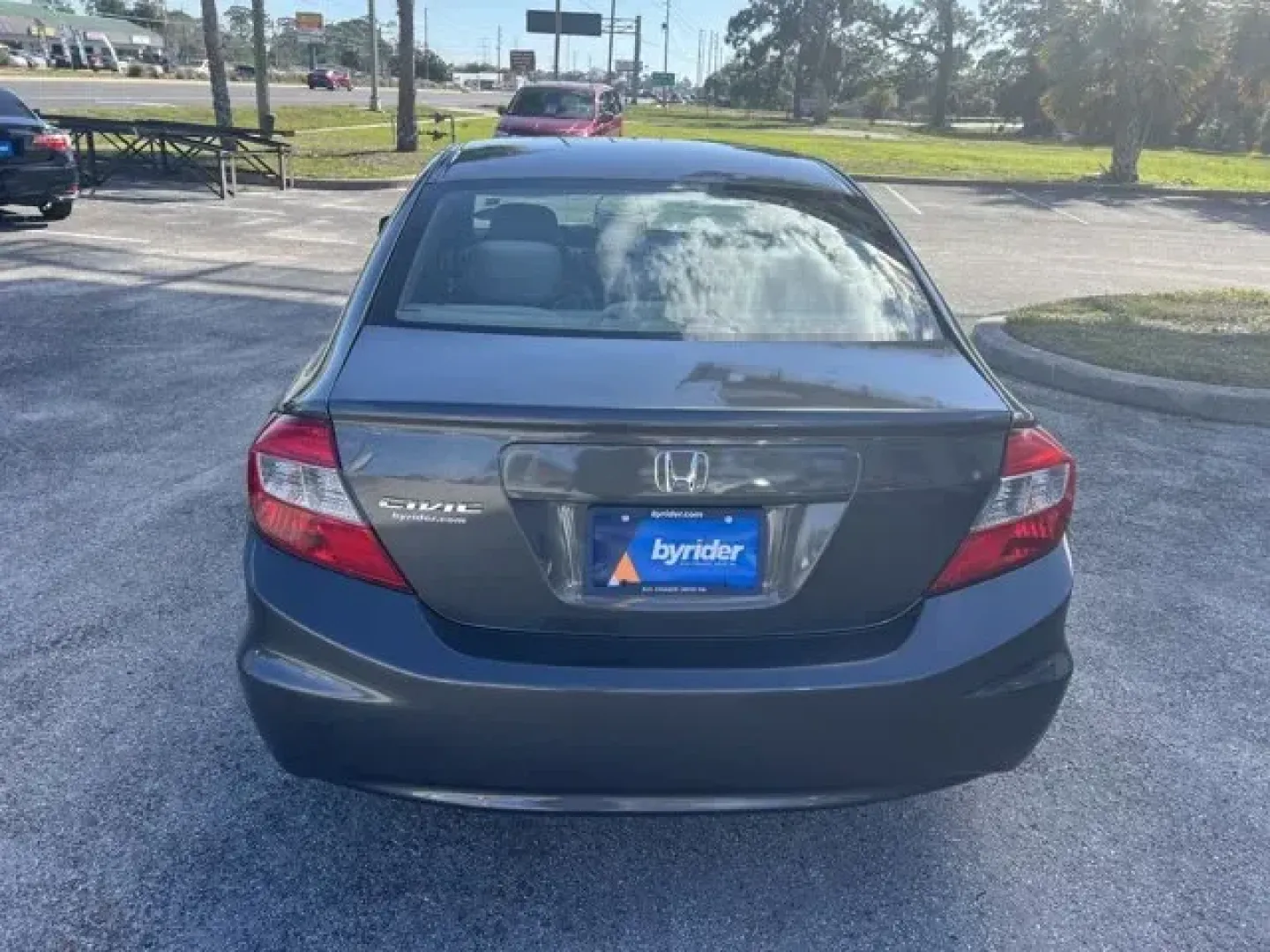 2012 Honda Civic (19XFB2F80CE) with an Other engine, AUTOMATIC transmission, located at 8829 US Hwy 19, Port Richey, FL, 34668, (727) 264-1107, 28.285917, -82.717346 - KBB.com Best Resale Value Awards. Only 142,636 Miles! Delivers 39 Highway MPG and 28 City MPG! This Honda Civic delivers a Gas I4 1.8L/110 engine powering this Automatic transmission. Vehicle Stability Assist (VSA) w/traction control, Variable intermittent windshield wipers, USB audio interface.* Th - Photo#4