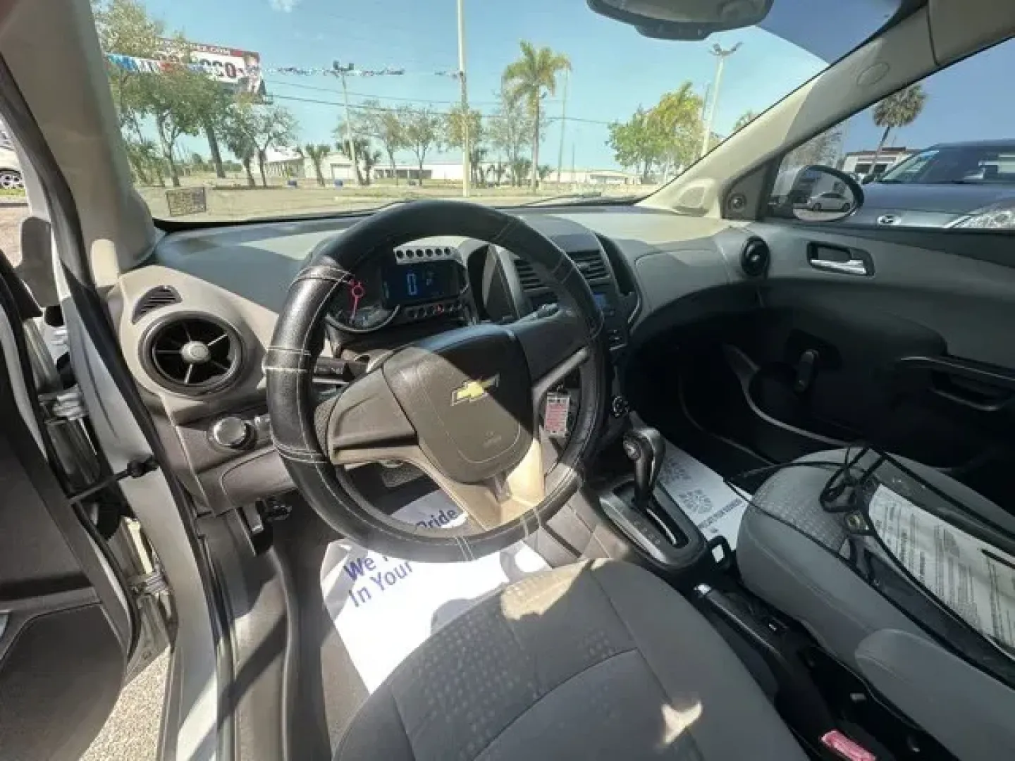 2012 Chevrolet Sonic (1G1JA5SH9C4) with an Other engine, AUTOMATIC transmission, located at 7701 Park Blvd., Pinellas Park, FL, 33781, (727) 369-7777, 27.839552, -82.747284 - IIHS Top Safety Pick. Only 95,600 Miles! Scores 35 Highway MPG and 25 City MPG! This Chevrolet Sonic boasts a Gas I4 1.8L/110 engine powering this Automatic transmission. TRANSMISSION, AUTOMATIC (STD), SILVER ICE METALLIC, SEATS, FRONT BUCKET WITH RECLINE AND HEIGHT-ADJUSTABLE HEADRESTS (STD).*This - Photo#4