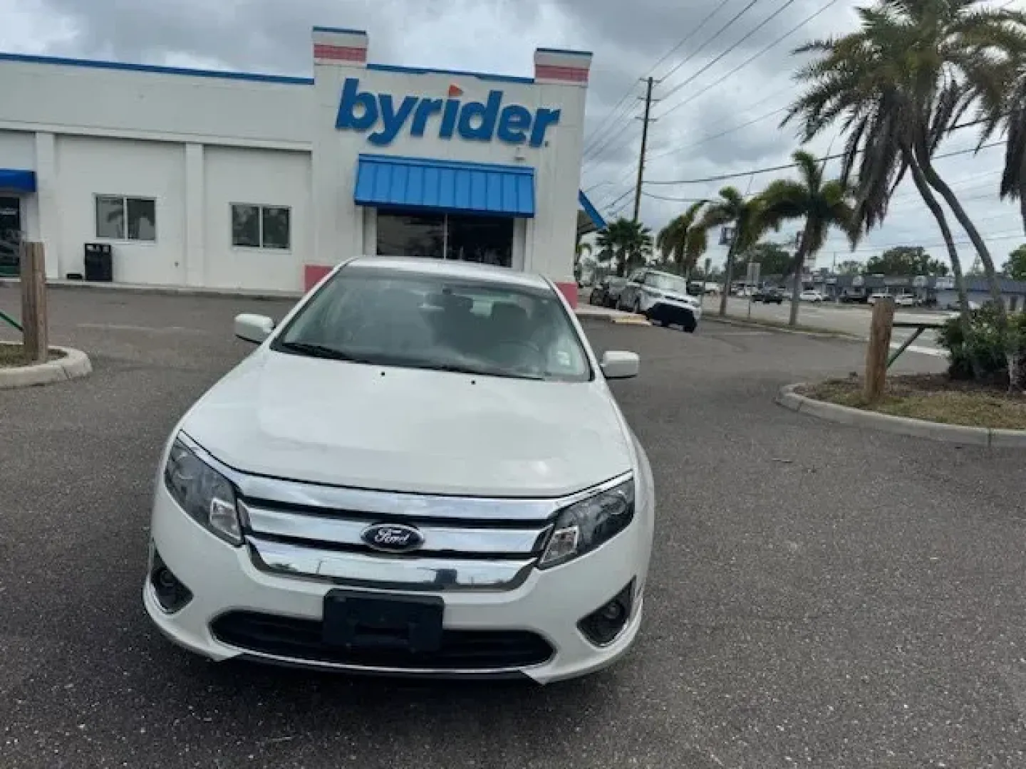 2012 Ford Fusion (3FAHP0JA5CR) with an Other engine, AUTOMATIC transmission, located at 8829 US Hwy 19, Port Richey, FL, 34668, (727) 264-1107, 28.285917, -82.717346 - IIHS Top Safety Pick. Only 111,340 Miles! Scores 33 Highway MPG and 23 City MPG! This Ford Fusion delivers a Gas I4 2.5L/152 engine powering this Automatic transmission. Universal garage door opener, Tire pressure monitoring system, Tilt/telescopic steering wheel.*This Ford Fusion Comes Equipped wit - Photo#0