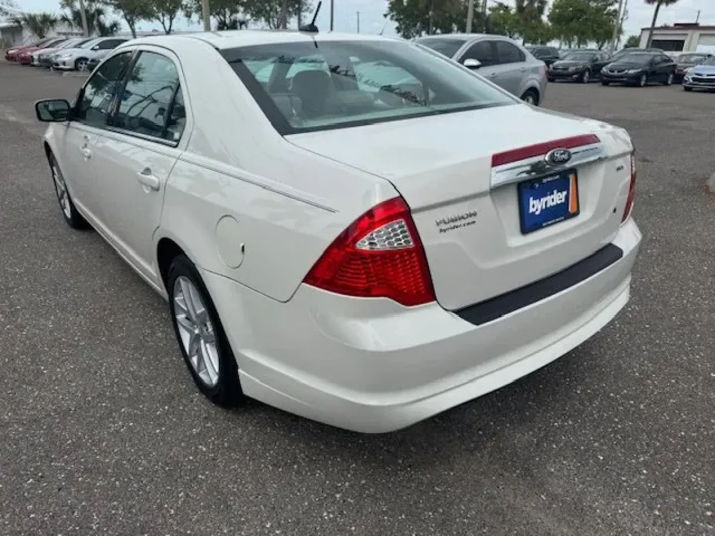 2012 Ford Fusion (3FAHP0JA5CR) with an Other engine, AUTOMATIC transmission, located at 8829 US Hwy 19, Port Richey, FL, 34668, (727) 264-1107, 28.285917, -82.717346 - IIHS Top Safety Pick. Only 111,340 Miles! Scores 33 Highway MPG and 23 City MPG! This Ford Fusion delivers a Gas I4 2.5L/152 engine powering this Automatic transmission. Universal garage door opener, Tire pressure monitoring system, Tilt/telescopic steering wheel.*This Ford Fusion Comes Equipped wit - Photo#1