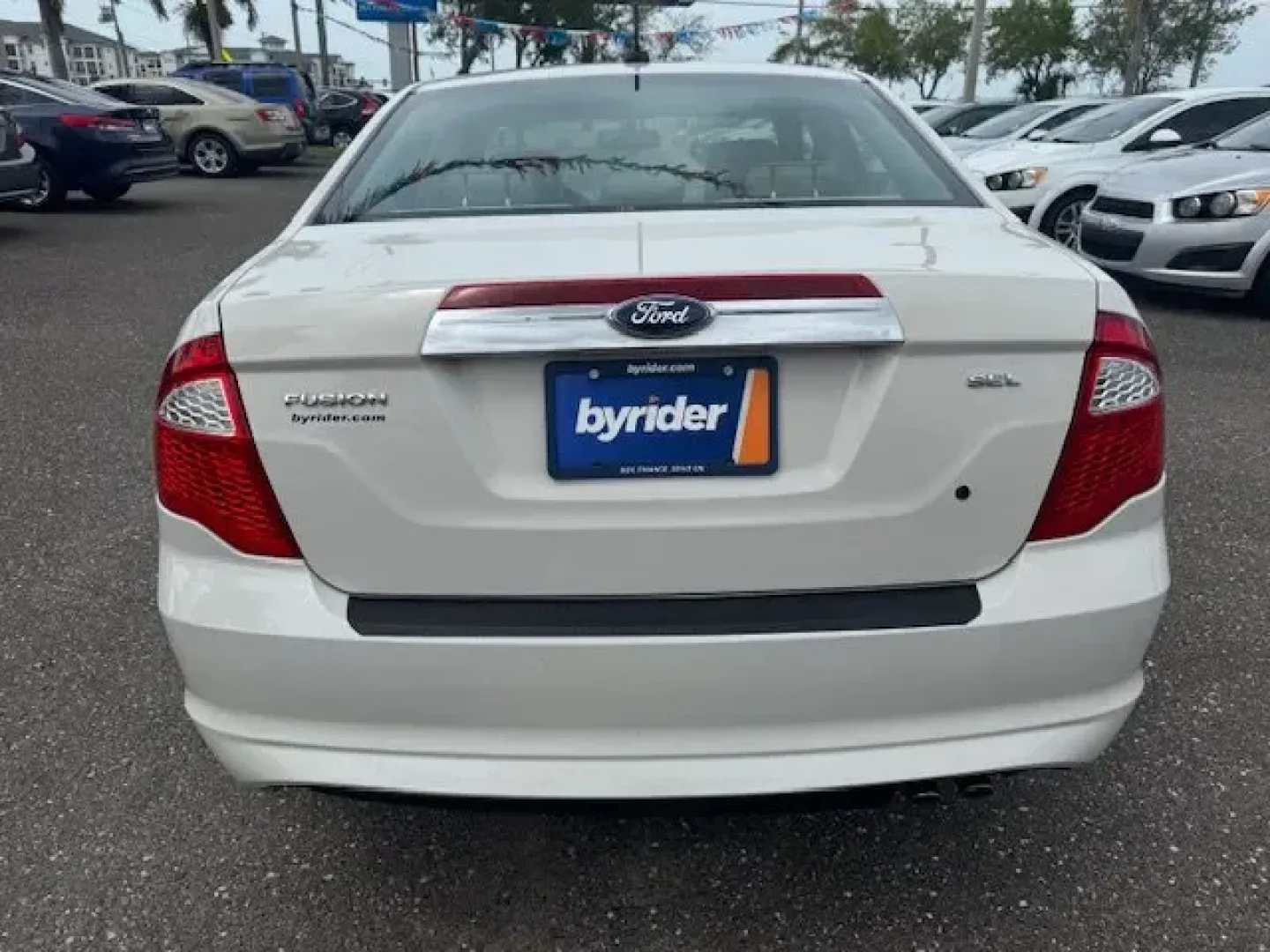 2012 Ford Fusion (3FAHP0JA5CR) with an Other engine, AUTOMATIC transmission, located at 8829 US Hwy 19, Port Richey, FL, 34668, (727) 264-1107, 28.285917, -82.717346 - IIHS Top Safety Pick. Only 111,340 Miles! Scores 33 Highway MPG and 23 City MPG! This Ford Fusion delivers a Gas I4 2.5L/152 engine powering this Automatic transmission. Universal garage door opener, Tire pressure monitoring system, Tilt/telescopic steering wheel.*This Ford Fusion Comes Equipped wit - Photo#2