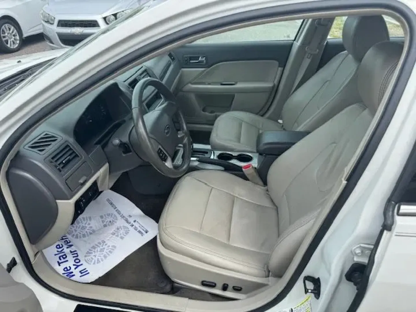 2012 Ford Fusion (3FAHP0JA5CR) with an Other engine, AUTOMATIC transmission, located at 8829 US Hwy 19, Port Richey, FL, 34668, (727) 264-1107, 28.285917, -82.717346 - IIHS Top Safety Pick. Only 111,340 Miles! Scores 33 Highway MPG and 23 City MPG! This Ford Fusion delivers a Gas I4 2.5L/152 engine powering this Automatic transmission. Universal garage door opener, Tire pressure monitoring system, Tilt/telescopic steering wheel.*This Ford Fusion Comes Equipped wit - Photo#3