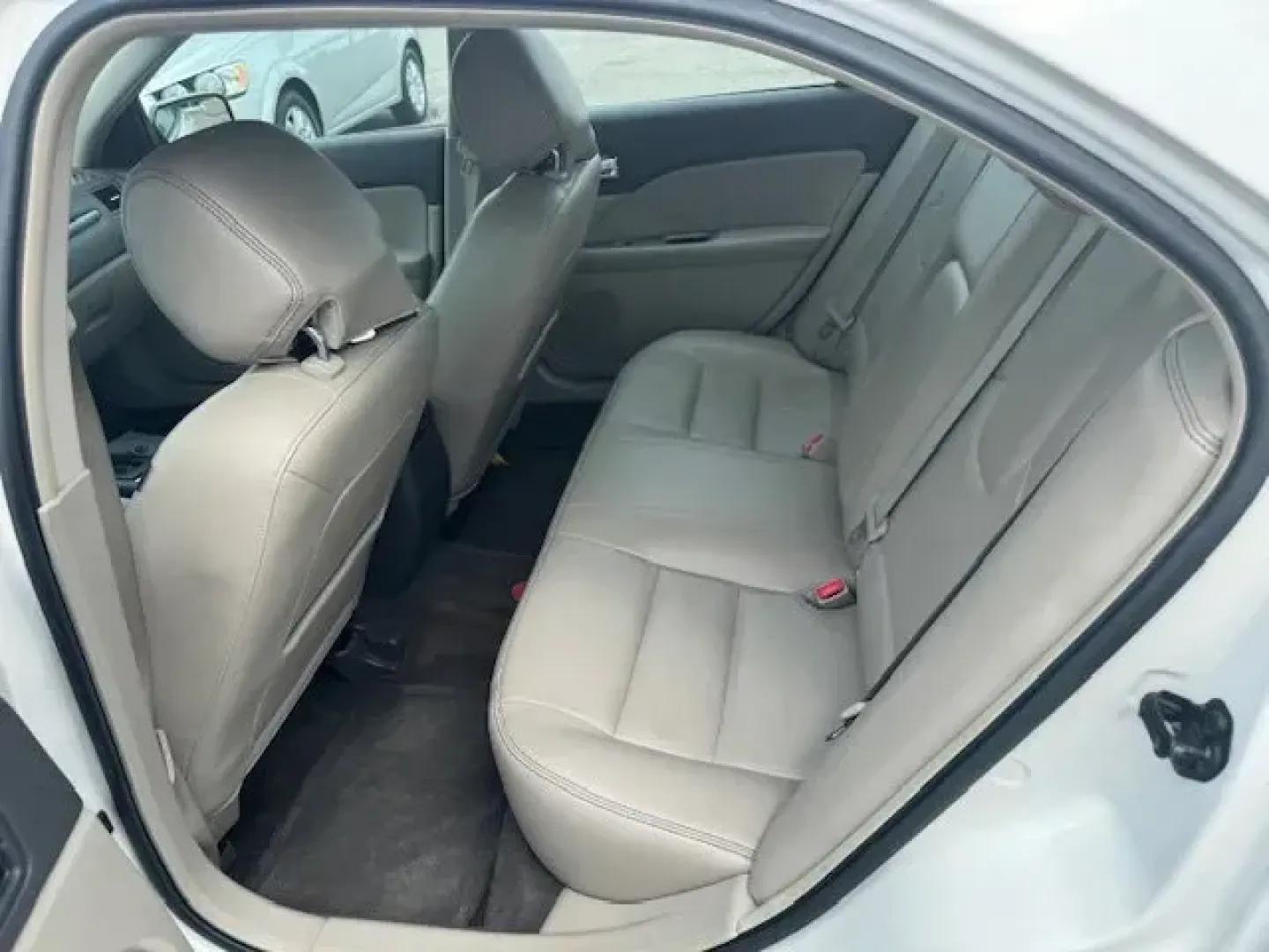 2012 Ford Fusion (3FAHP0JA5CR) with an Other engine, AUTOMATIC transmission, located at 8829 US Hwy 19, Port Richey, FL, 34668, (727) 264-1107, 28.285917, -82.717346 - IIHS Top Safety Pick. Only 111,340 Miles! Scores 33 Highway MPG and 23 City MPG! This Ford Fusion delivers a Gas I4 2.5L/152 engine powering this Automatic transmission. Universal garage door opener, Tire pressure monitoring system, Tilt/telescopic steering wheel.*This Ford Fusion Comes Equipped wit - Photo#4
