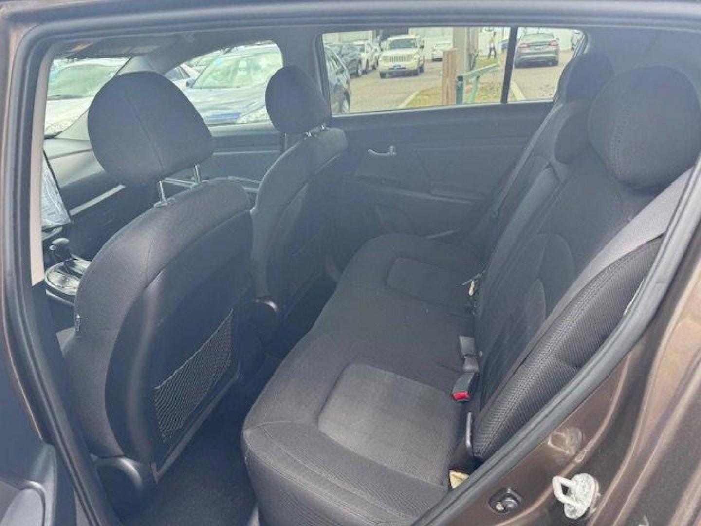 2011 Kia Sportage (KNDPB3A29B7) with an Other engine, AUTOMATIC transmission, located at 7701 Park Blvd., Pinellas Park, FL, 33781, (727) 369-7777, 27.839552, -82.747284 - IIHS Top Safety Pick. Only 149,668 Miles! Delivers 31 Highway MPG and 22 City MPG! This Kia Sportage delivers a Gas I4 2.4L/144 engine powering this Automatic transmission. SAND TRACK, CONVENIENCE PKG -inc: rear parking assist, 17 alloy wheels, telescopic steering wheel function, roof rails, rear sp - Photo#5