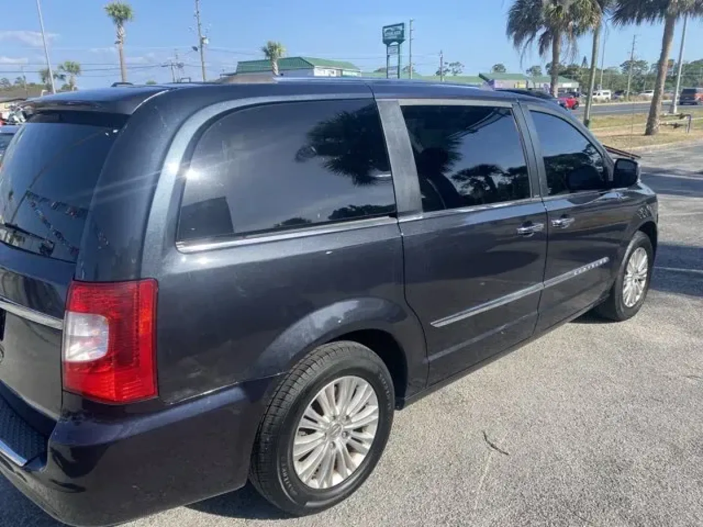 2013 Chrysler Town and Country (2C4RC1GG1DR) with an Other engine, AUTOMATIC transmission, located at 8829 US Hwy 19, Port Richey, FL, 34668, (727) 264-1107, 28.285917, -82.717346 - Ward's 10 Best Engines. Scores 25 Highway MPG and 17 City MPG! This Chrysler Town and Country delivers a Gas V6 3.6L/220 engine powering this Automatic transmission. P225/65R17 ALL-SEASON BSW TIRES (STD), MAXIMUM STEEL METALLIC, LUXURY GROUP -inc: load leveling and height control, pwr sunroof, pwr - Photo#2