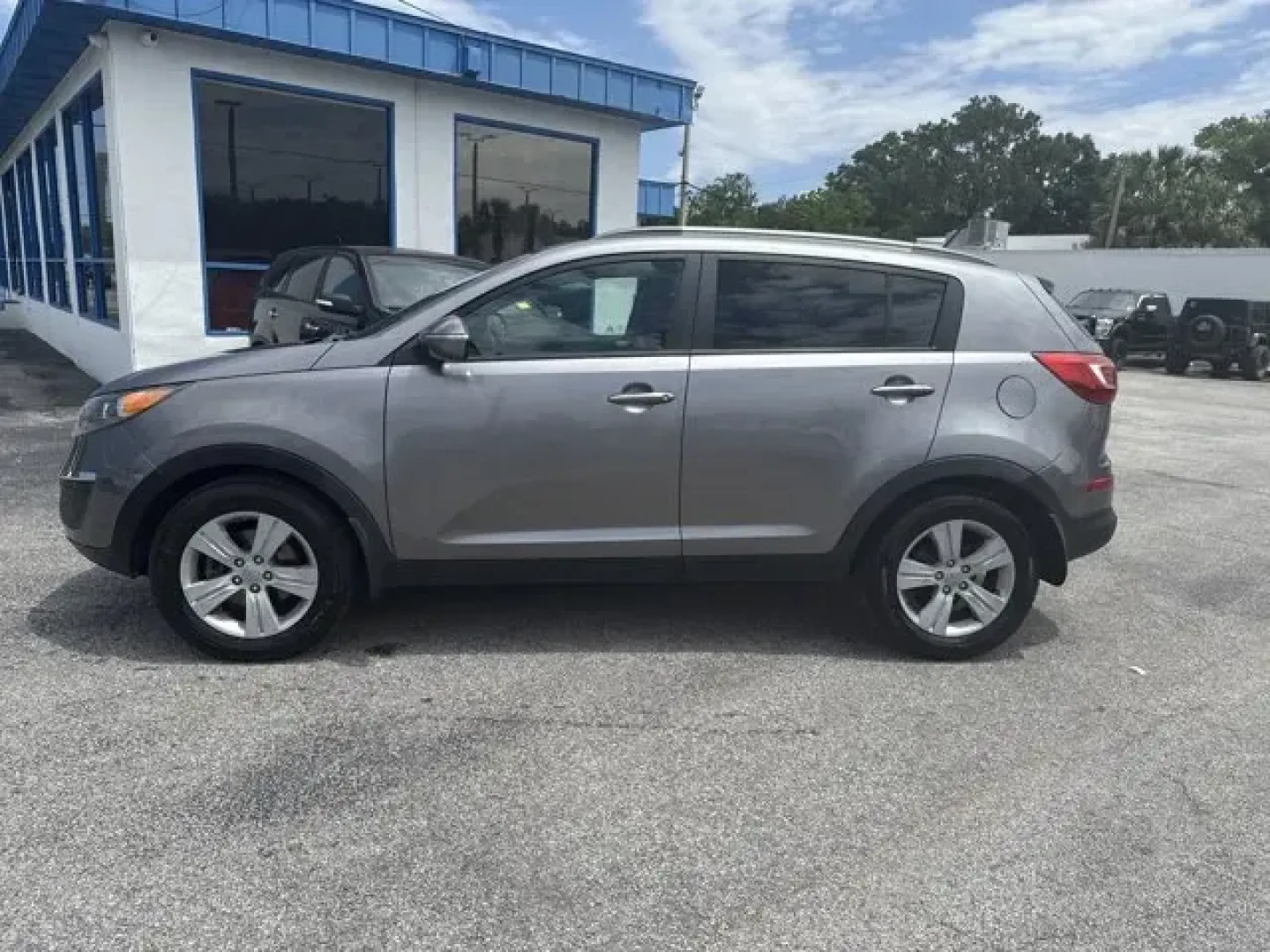 2012 Kia Sportage (KNDPB3A20C7) with an Other engine, AUTOMATIC transmission, located at 1285 Cassat Ave, Jacksonville, FL, 32205, (904) 425-3000, 30.299780, -81.732430 - IIHS Top Safety Pick. Only 130,450 Miles! Delivers 30 Highway MPG and 21 City MPG! This Kia Sportage delivers a Gas I4 2.4L/144 engine powering this Automatic transmission. MINERAL SILVER, CONVENIENCE PKG -inc: rear parking assist, telescopic steering wheel function, roof rails, rear spoiler, dual h - Photo#2