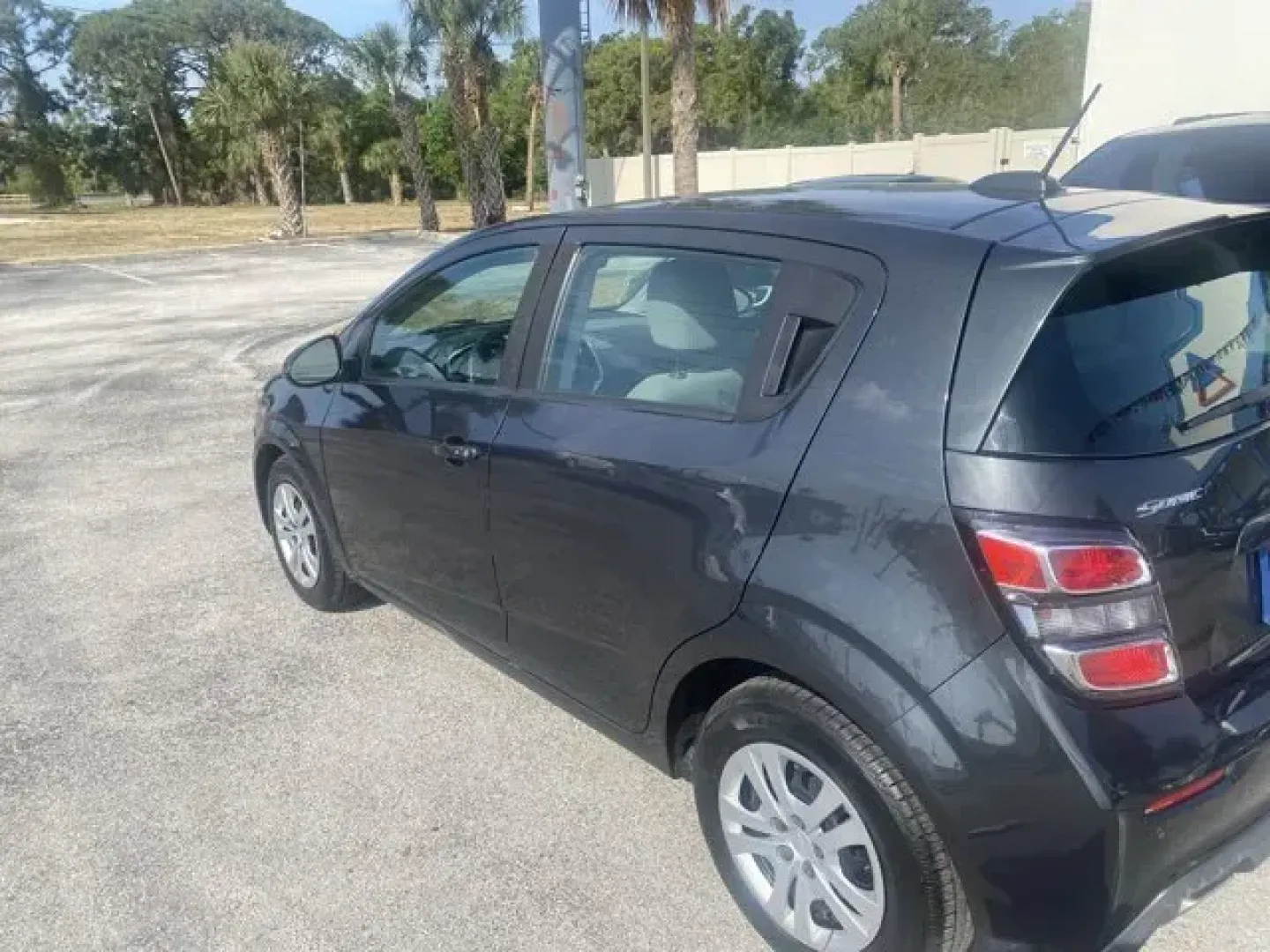 2020 Chevrolet Sonic (1G1JG6SB7L4) with an Other engine, AUTOMATIC transmission, located at 8829 US Hwy 19, Port Richey, FL, 34668, (727) 264-1107, 28.285917, -82.717346 - Only 50,235 Miles! Scores 34 Highway MPG and 26 City MPG! This Chevrolet Sonic boasts a Turbocharged Gas I4 1.4L/83 engine powering this Automatic transmission. TRANSMISSION, 6-SPEED AUTOMATIC (STD), SEATS, FRONT BUCKET WITH RECLINE AND HEIGHT-ADJUSTABLE HEADRESTS (STD), REAR PARK ASSIST.*This Chevr - Photo#4