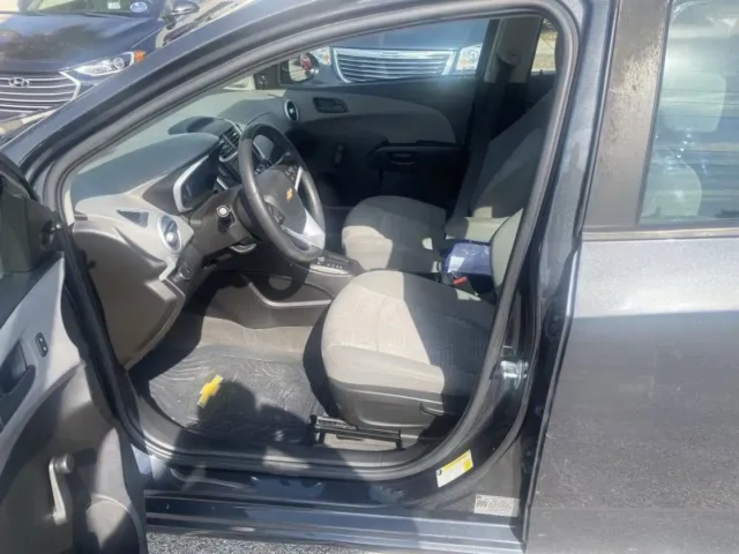 2020 Chevrolet Sonic (1G1JG6SB7L4) with an Other engine, AUTOMATIC transmission, located at 8829 US Hwy 19, Port Richey, FL, 34668, (727) 264-1107, 28.285917, -82.717346 - Only 50,235 Miles! Scores 34 Highway MPG and 26 City MPG! This Chevrolet Sonic boasts a Turbocharged Gas I4 1.4L/83 engine powering this Automatic transmission. TRANSMISSION, 6-SPEED AUTOMATIC (STD), SEATS, FRONT BUCKET WITH RECLINE AND HEIGHT-ADJUSTABLE HEADRESTS (STD), REAR PARK ASSIST.*This Chevr - Photo#5