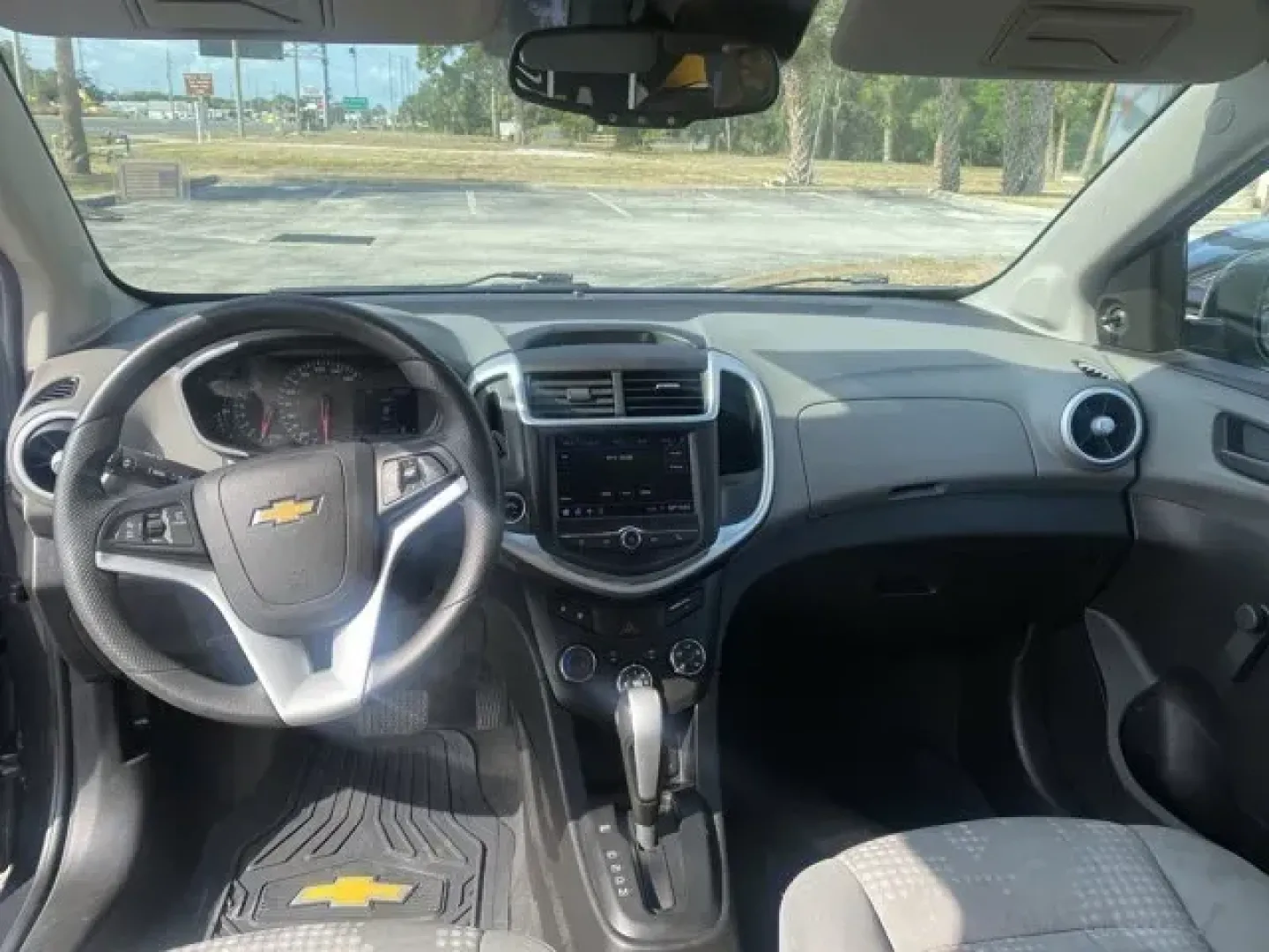 2020 Chevrolet Sonic (1G1JG6SB7L4) with an Other engine, AUTOMATIC transmission, located at 8829 US Hwy 19, Port Richey, FL, 34668, (727) 264-1107, 28.285917, -82.717346 - Only 50,235 Miles! Scores 34 Highway MPG and 26 City MPG! This Chevrolet Sonic boasts a Turbocharged Gas I4 1.4L/83 engine powering this Automatic transmission. TRANSMISSION, 6-SPEED AUTOMATIC (STD), SEATS, FRONT BUCKET WITH RECLINE AND HEIGHT-ADJUSTABLE HEADRESTS (STD), REAR PARK ASSIST.*This Chevr - Photo#7