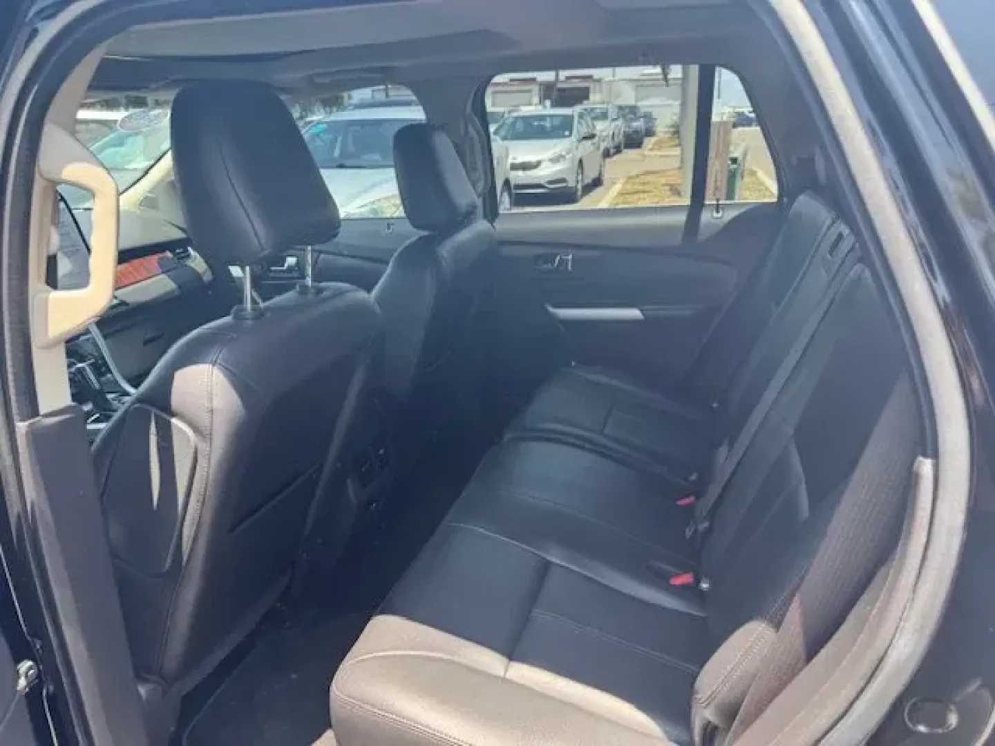 2011 Ford Edge (2FMDK3KC3BB) with an Other engine, AUTOMATIC transmission, located at 7701 Park Blvd., Pinellas Park, FL, 33781, (727) 369-7777, 27.839552, -82.747284 - IIHS Top Safety Pick (built after 2/11). Only 151,782 Miles! Scores 27 Highway MPG and 19 City MPG! This Ford Edge delivers a Gas V6 3.5L/213 engine powering this Automatic transmission. Wood appearance instrument panel appliques, Universal garage door opener, Tire pressure monitoring system.*This F - Photo#6