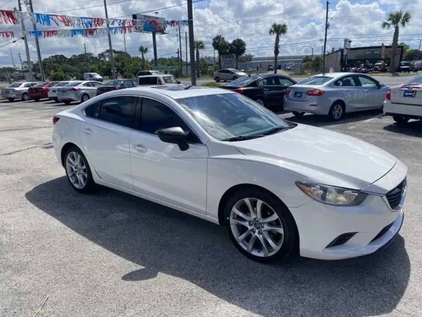 2015 Mazda Mazda6 (JM1GJ1V5XF1) with an Other engine, AUTOMATIC transmission, located at 8829 US Hwy 19, Port Richey, FL, 34668, (727) 264-1107, 28.285917, -82.717346 - IIHS Top Safety Pick+. Delivers 38 Highway MPG and 26 City MPG! This Mazda Mazda6 delivers a Regular Unleaded I-4 2.5 L/152 engine powering this Automatic transmission. WHEEL LOCKS, SAND, LEATHERETTE SEAT TRIM, MOONROOF and BOSE AUDIO W/SIRIUSXM PACKAGE -inc: Bose 11-Speaker Sound System, SIRIUSXM - Photo#2