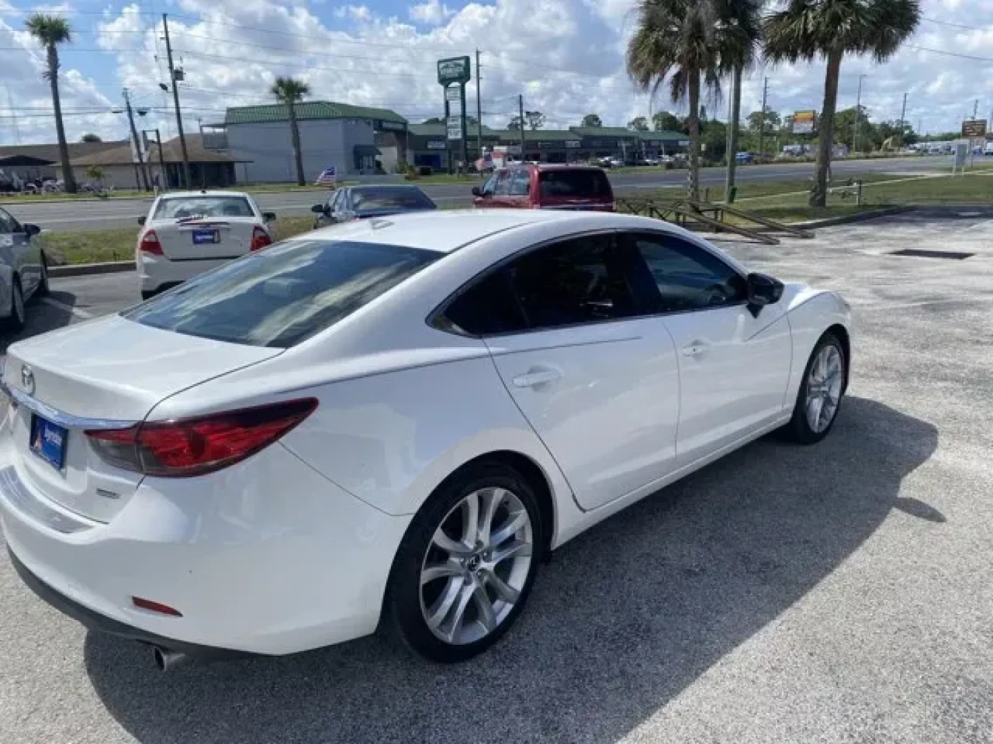 2015 Mazda Mazda6 (JM1GJ1V5XF1) with an Other engine, AUTOMATIC transmission, located at 8829 US Hwy 19, Port Richey, FL, 34668, (727) 264-1107, 28.285917, -82.717346 - IIHS Top Safety Pick+. Delivers 38 Highway MPG and 26 City MPG! This Mazda Mazda6 delivers a Regular Unleaded I-4 2.5 L/152 engine powering this Automatic transmission. WHEEL LOCKS, SAND, LEATHERETTE SEAT TRIM, MOONROOF and BOSE AUDIO W/SIRIUSXM PACKAGE -inc: Bose 11-Speaker Sound System, SIRIUSXM - Photo#3