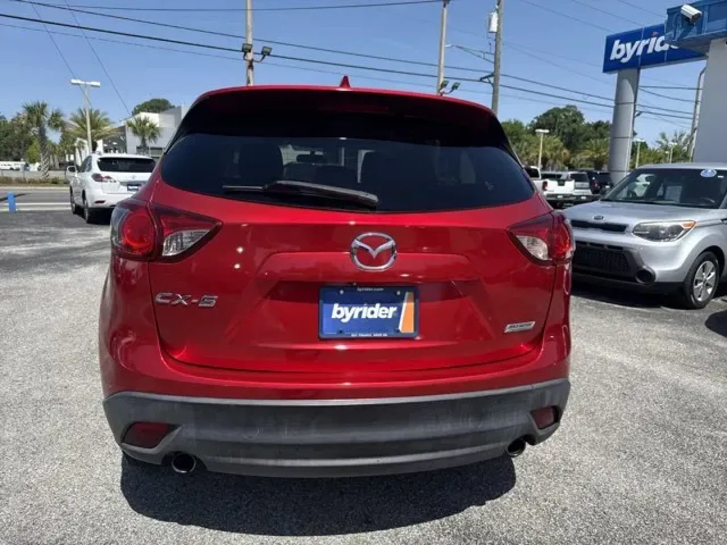 2015 Mazda CX-5 (JM3KE2CY1F0) with an Other engine, AUTOMATIC transmission, located at 1285 Cassat Ave, Jacksonville, FL, 32205, (904) 425-3000, 30.299780, -81.732430 - IIHS Top Safety Pick+. Boasts 32 Highway MPG and 25 City MPG! This Mazda CX-5 delivers a Regular Unleaded I-4 2.5 L/152 engine powering this Automatic transmission. WHEEL LOCKS, SOUL RED METALLIC PAINT, Wheels: 17 x 7J Aluminum Alloy.*This Mazda CX-5 Comes Equipped with These Options *Wheels w/Silve - Photo#5