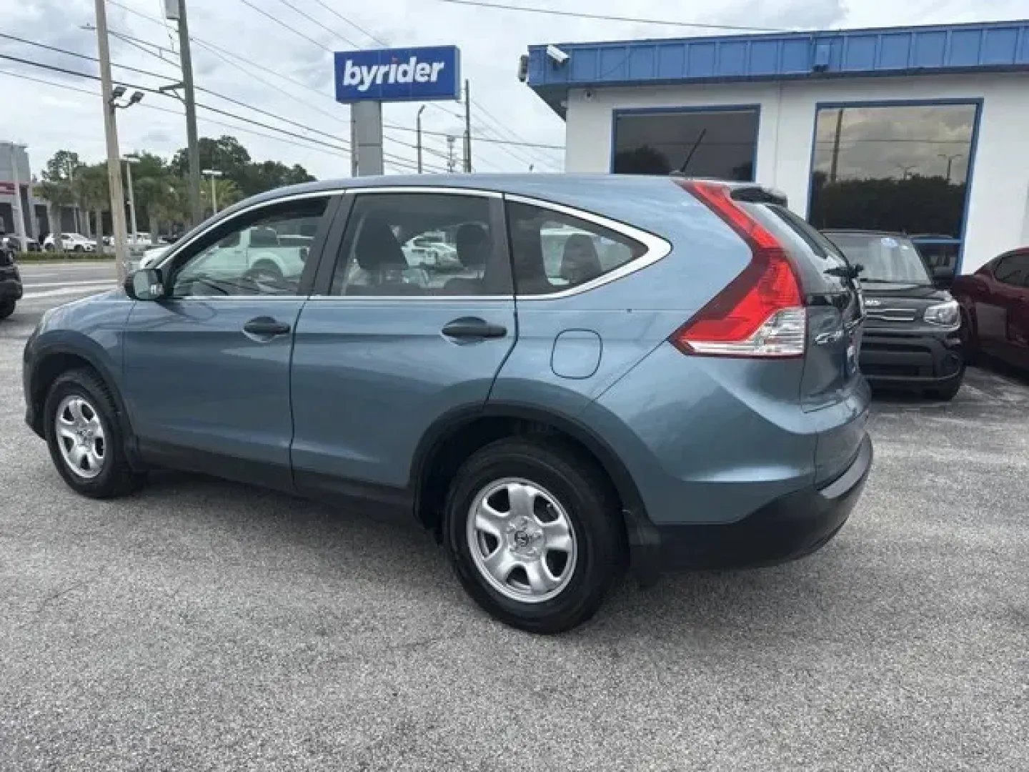 2013 Honda CR-V (5J6RM3H3XDL) with an Other engine, AUTOMATIC transmission, located at 1285 Cassat Ave, Jacksonville, FL, 32205, (904) 425-3000, 30.299780, -81.732430 - KBB.com Brand Image Awards. Only 113,952 Miles! Delivers 31 Highway MPG and 23 City MPG! This Honda CR-V delivers a Gas I4 2.4L/144 engine powering this Automatic transmission. Vehicle stability assist (VSA) w/traction control, Tire pressure monitoring system, Tilt and telescopic steering column.* - Photo#4