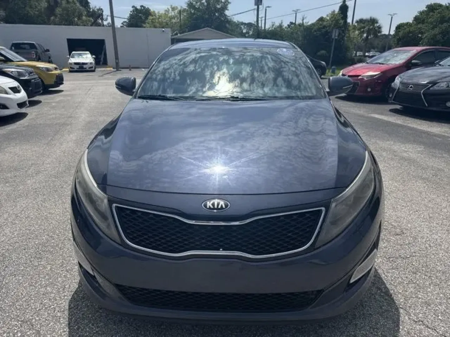 2015 Kia Optima (5XXGN4A78FG) with an Other engine, AUTOMATIC transmission, located at 1285 Cassat Ave, Jacksonville, FL, 32205, (904) 425-3000, 30.299780, -81.732430 - **Discover Your Next Adventure in the 2015 Kia Optima! Perfect for Commuters and Growing Families Alike!**<br /> <br /> Are you seeking a reliable vehicle that fits seamlessly into your busy lifestyle? Look no further than this stunning 2015 Kia Optima, now available at Byrider Florida #139 in Jacks - Photo#2