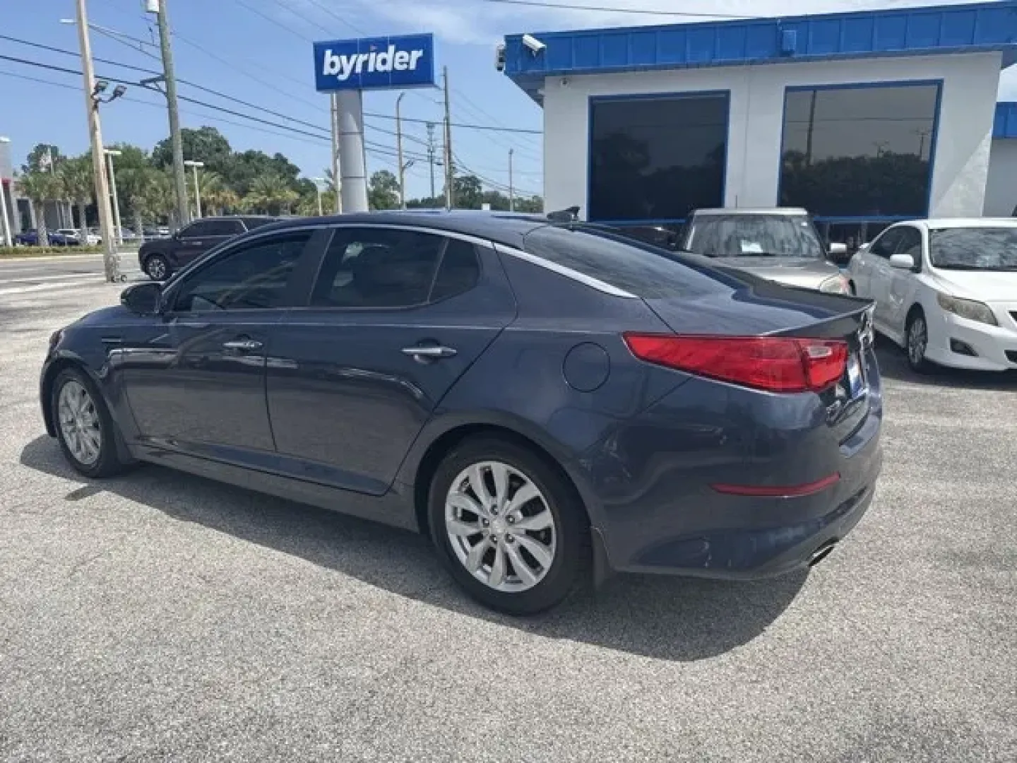 2015 Kia Optima (5XXGN4A78FG) with an Other engine, AUTOMATIC transmission, located at 1285 Cassat Ave, Jacksonville, FL, 32205, (904) 425-3000, 30.299780, -81.732430 - **Discover Your Next Adventure in the 2015 Kia Optima! Perfect for Commuters and Growing Families Alike!**<br /> <br /> Are you seeking a reliable vehicle that fits seamlessly into your busy lifestyle? Look no further than this stunning 2015 Kia Optima, now available at Byrider Florida #139 in Jacks - Photo#4