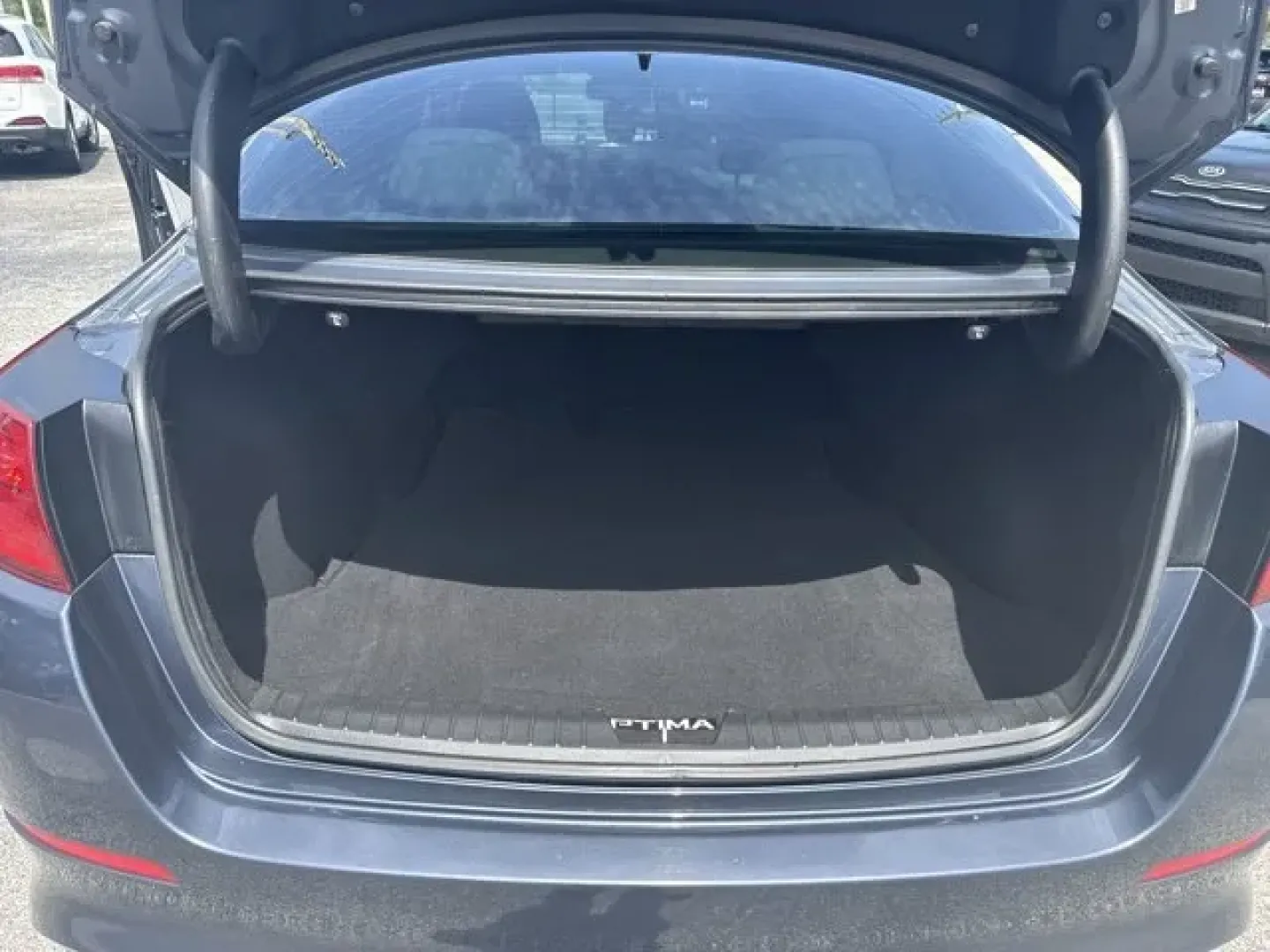 2015 Kia Optima (5XXGN4A78FG) with an Other engine, AUTOMATIC transmission, located at 1285 Cassat Ave, Jacksonville, FL, 32205, (904) 425-3000, 30.299780, -81.732430 - **Discover Your Next Adventure in the 2015 Kia Optima! Perfect for Commuters and Growing Families Alike!**<br /> <br /> Are you seeking a reliable vehicle that fits seamlessly into your busy lifestyle? Look no further than this stunning 2015 Kia Optima, now available at Byrider Florida #139 in Jacks - Photo#7