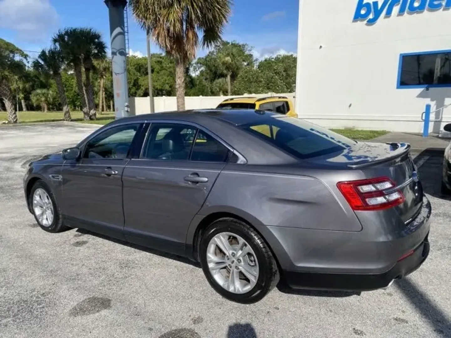 2014 Ford Taurus (1FAHP2E80EG) with an Other engine, AUTOMATIC transmission, located at 8829 US Hwy 19, Port Richey, FL, 34668, (727) 264-1107, 28.285917, -82.717346 - **Experience the Perfect Blend of Style and Performance with This 2014 Ford Taurus!**<br /> <br /> Are you searching for a reliable vehicle that seamlessly fits into your busy lifestyle? Whether you're commuting to work, shuttling kids around, or embarking on a weekend adventure, the 2014 Ford Tauru - Photo#5
