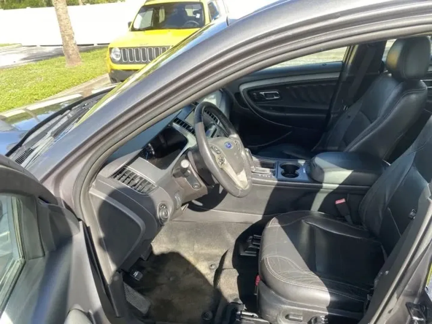 2014 Ford Taurus (1FAHP2E80EG) with an Other engine, AUTOMATIC transmission, located at 8829 US Hwy 19, Port Richey, FL, 34668, (727) 264-1107, 28.285917, -82.717346 - **Experience the Perfect Blend of Style and Performance with This 2014 Ford Taurus!**<br /> <br /> Are you searching for a reliable vehicle that seamlessly fits into your busy lifestyle? Whether you're commuting to work, shuttling kids around, or embarking on a weekend adventure, the 2014 Ford Tauru - Photo#6